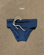 Front view of navy Lobby’s Nippers swim briefs, featuring a white rope drawstring and classic brief silhouette.