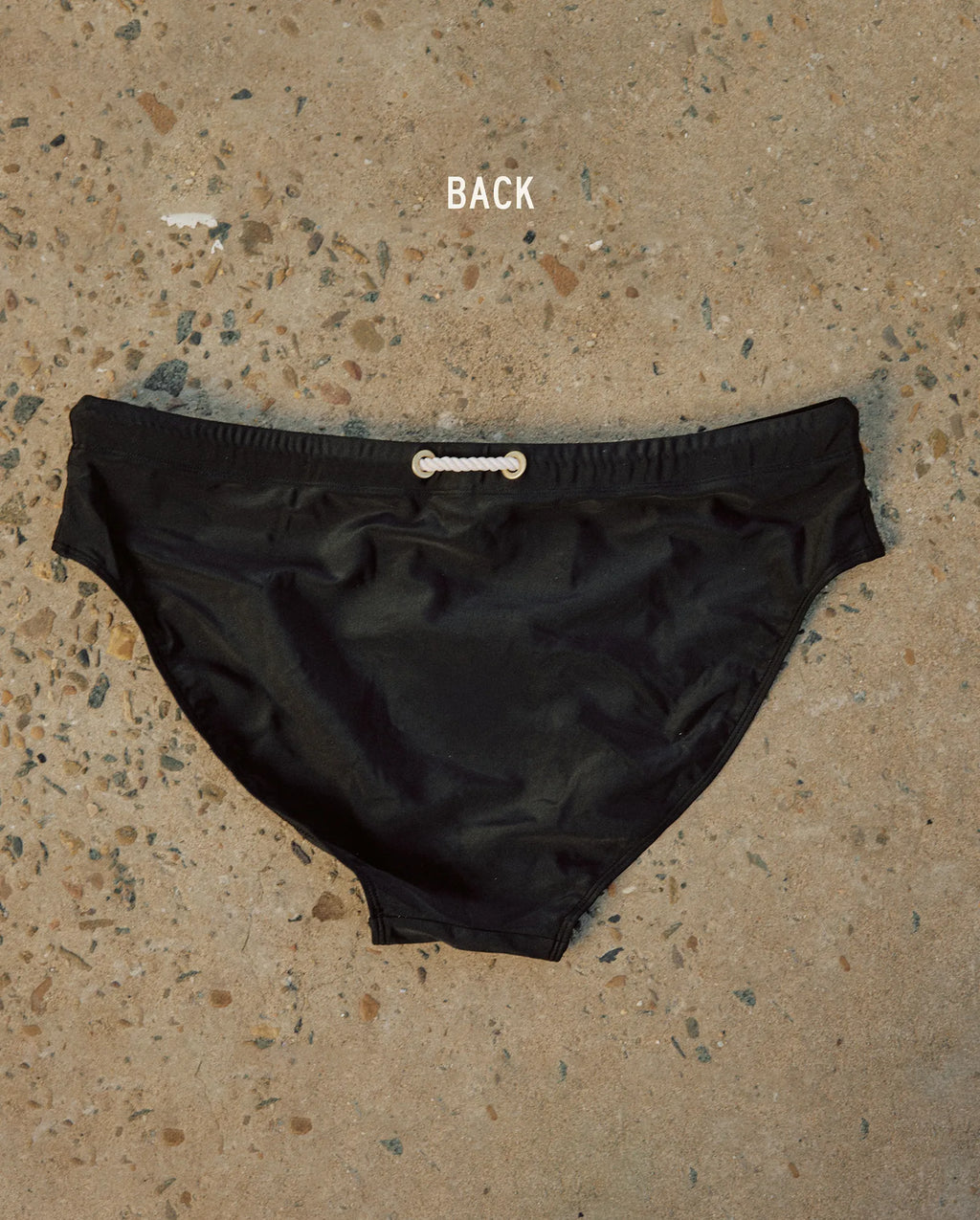 Lobby’s black swim briefs – refined and elegant swimwear, back view