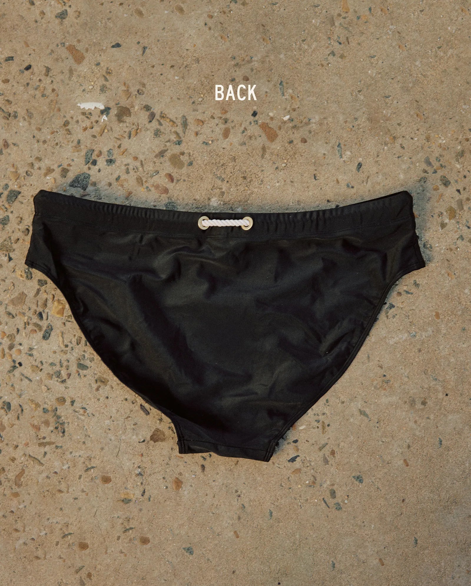 Lobby’s black swim briefs – refined and elegant swimwear, back view
