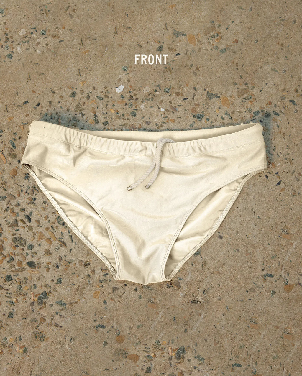 White Lobby’s one-piece swimwear, front view, minimalist design with refined silhouette on neutral background.