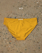 Back view of yellow Lobby’s one-piece swimwear, sculpted silhouette with elegant low-back design.